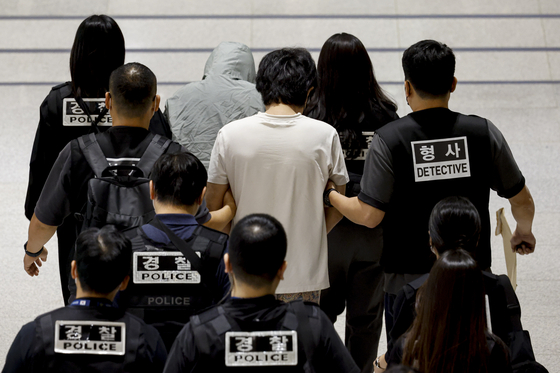 Suspects Repatriated from Cambodia Allegedly Coordinated False Statements Under Ringleader’s Direction