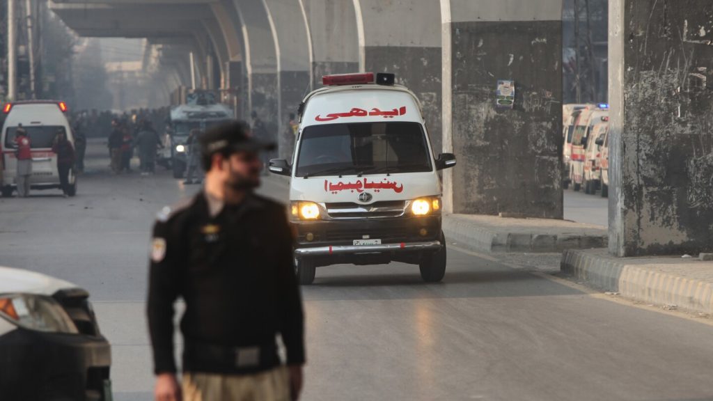 Suicide bombers strike security force headquarters in northwestern Pakistan, killing 3 officers