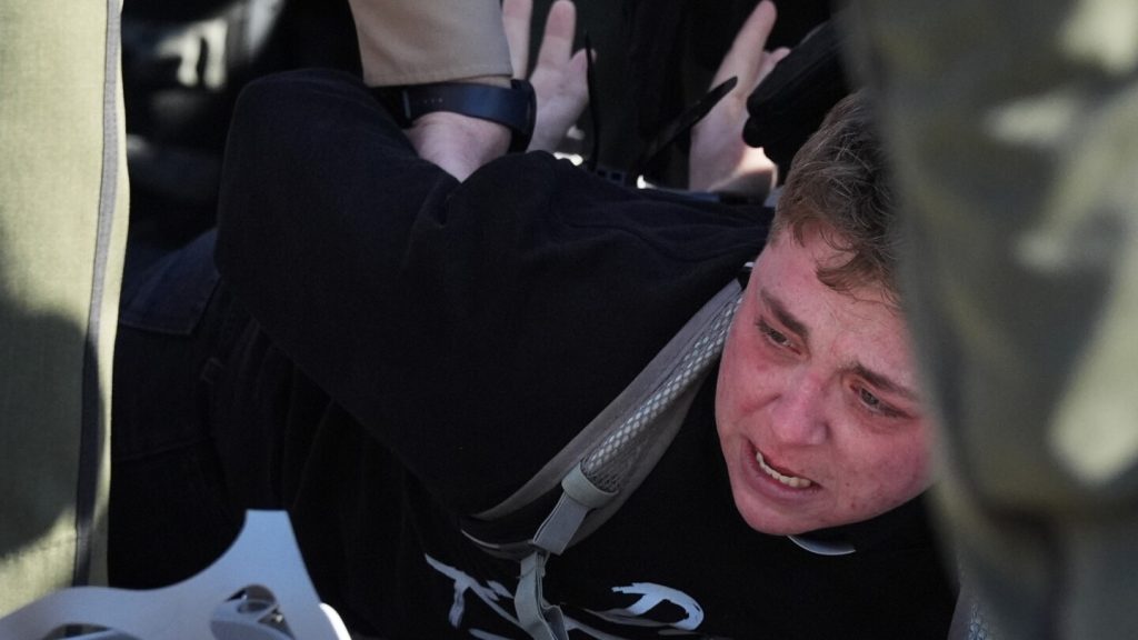 Protesters arrested, officers injured in clash outside Chicago-area immigration facility