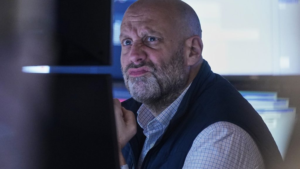 Stocks wind up mixed on Wall Street after spending most of the day in the red