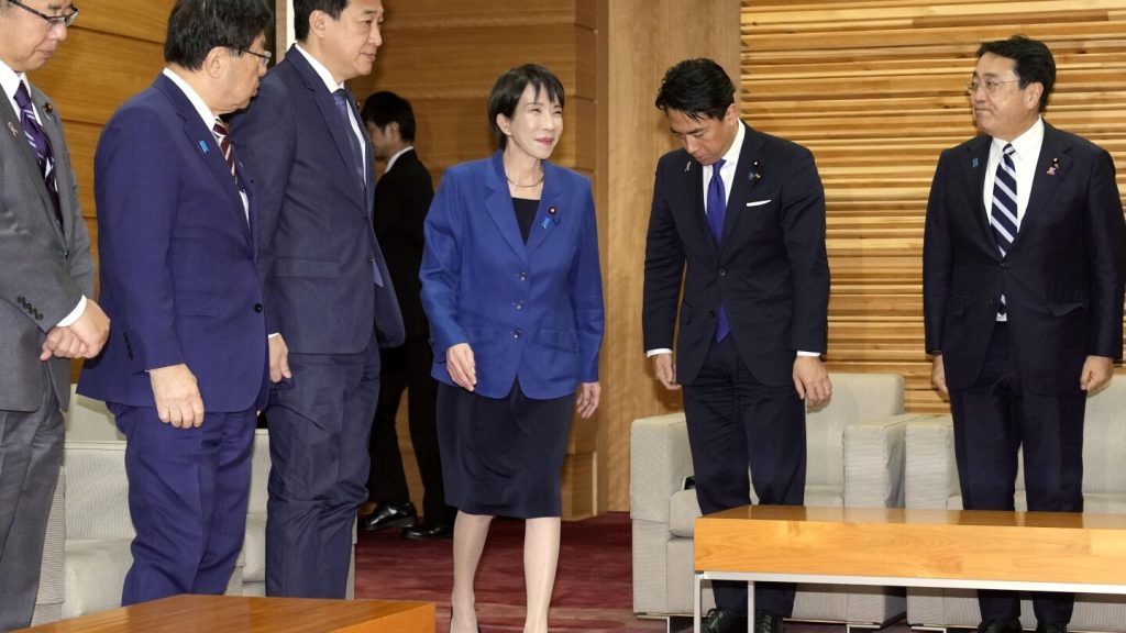 Japan OKs $135 billion stimulus package to help revive its sluggish economy