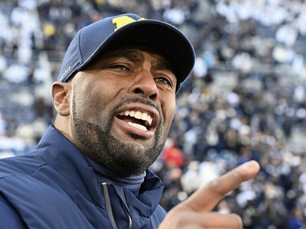 Michigan Coach Sherrone Moore Faces False Rumors Amid Team’s Spotlight