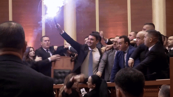 Albanian Opposition Disrupts Parliament with Flares, Clashes with Police Over Corruption Investigation