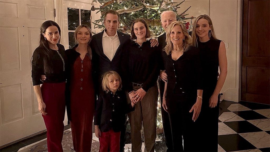 Biden Takes Background Role in Family Christmas Photo as Hunter Stands Center Stage