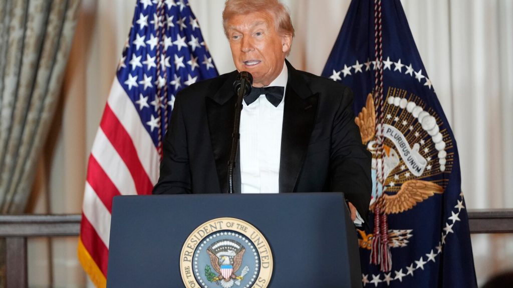 Trump awards medals to the Kennedy Center honorees in an Oval Office ceremony