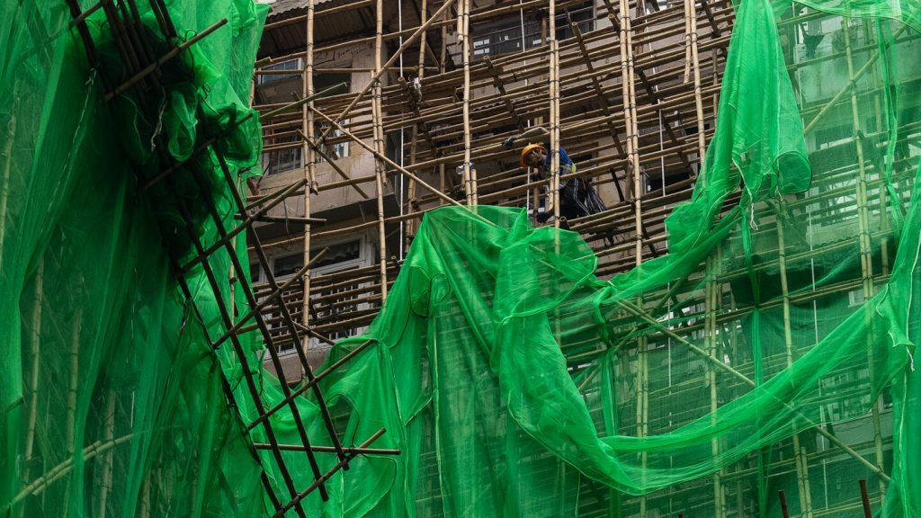 Hong Kong residents and experts defend bamboo scaffolding after deadly fire