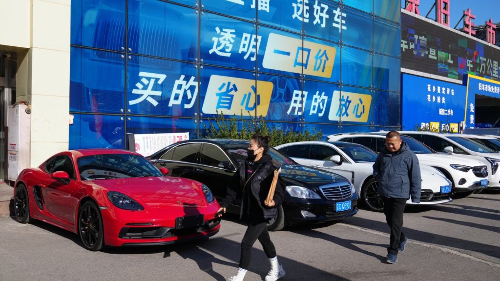 High-end car sales sink in China as its economy slows, taking a toll on European automakers