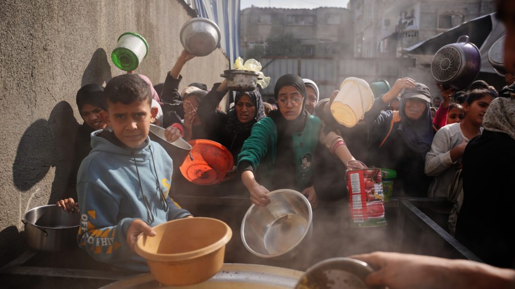 Spread of famine in Gaza Strip averted but Palestinians there still face starvation, experts say