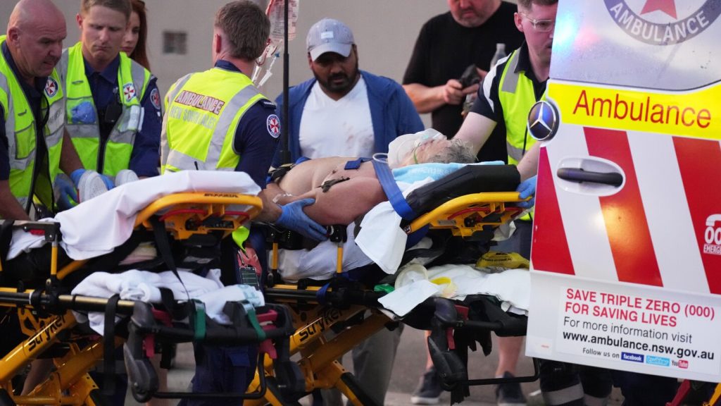 Bystander shown in videos disarming gunman during Australian beach shooting commended for bravery