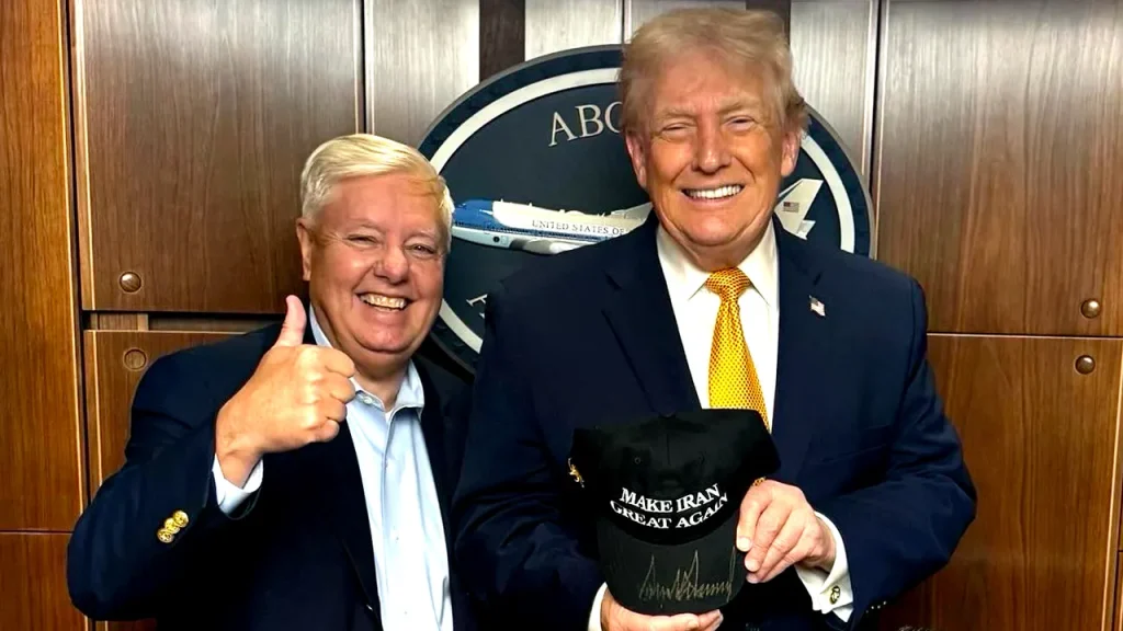 Trump Signs ‘Make Iran Great Again’ Hat in Appearance with Senator Graham