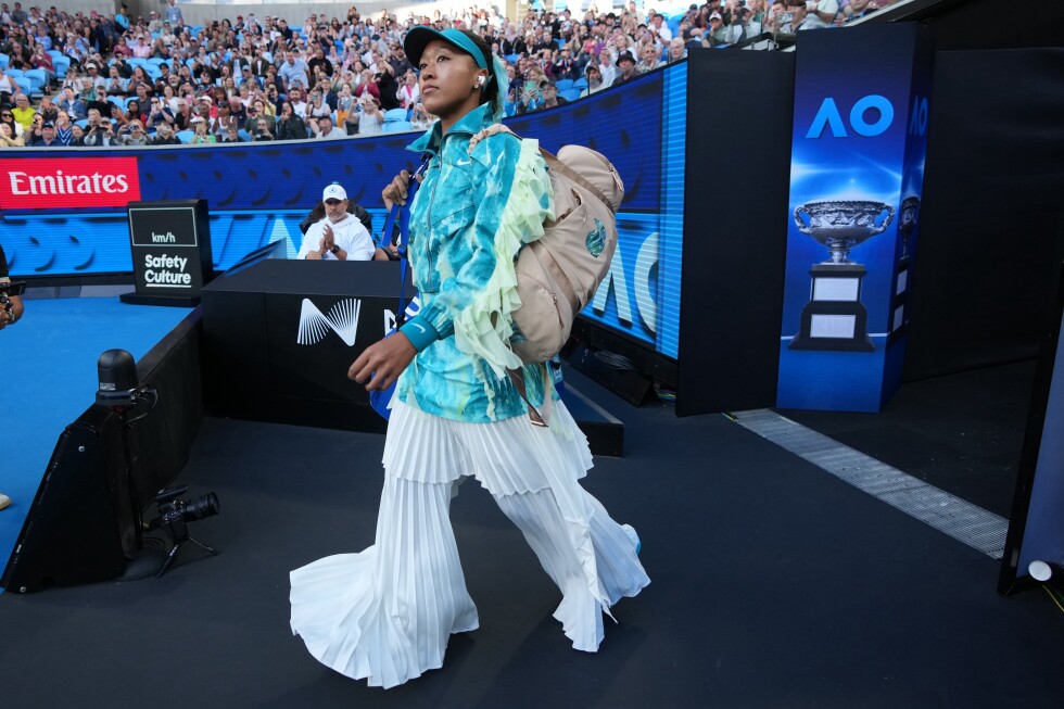 Naomi Osaka tones down her walk-on outfit. Turns up the heat at Australian Open