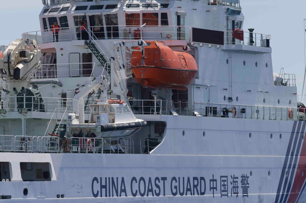 China says 2 people are dead and 4 are missing after boat capsizes near disputed shoal