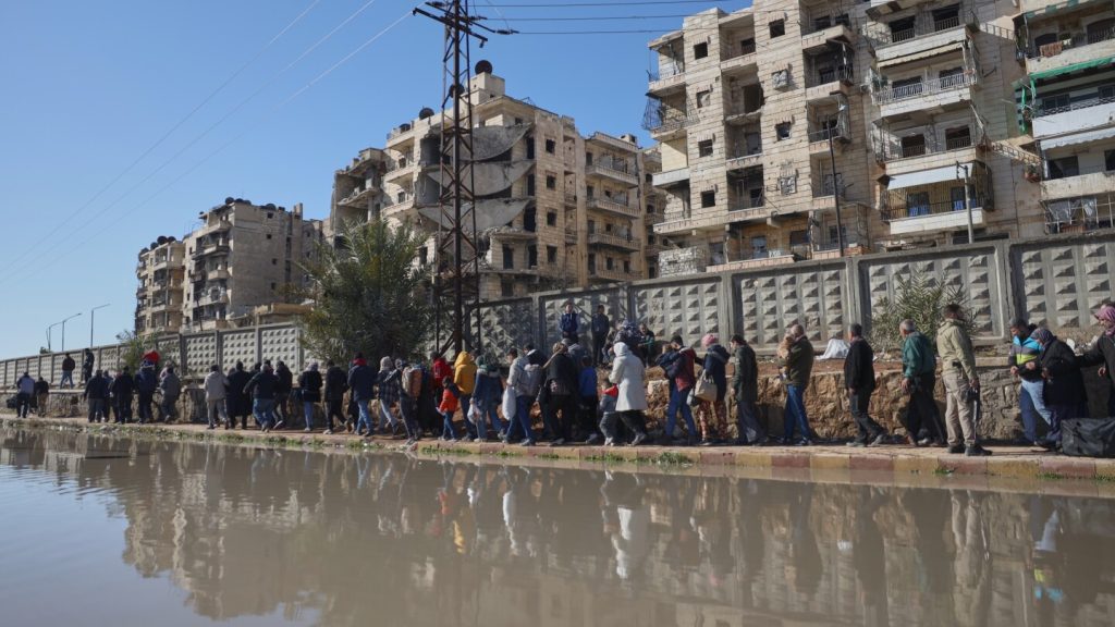 Kurdish fighters evacuated from Aleppo after days of violent clashes