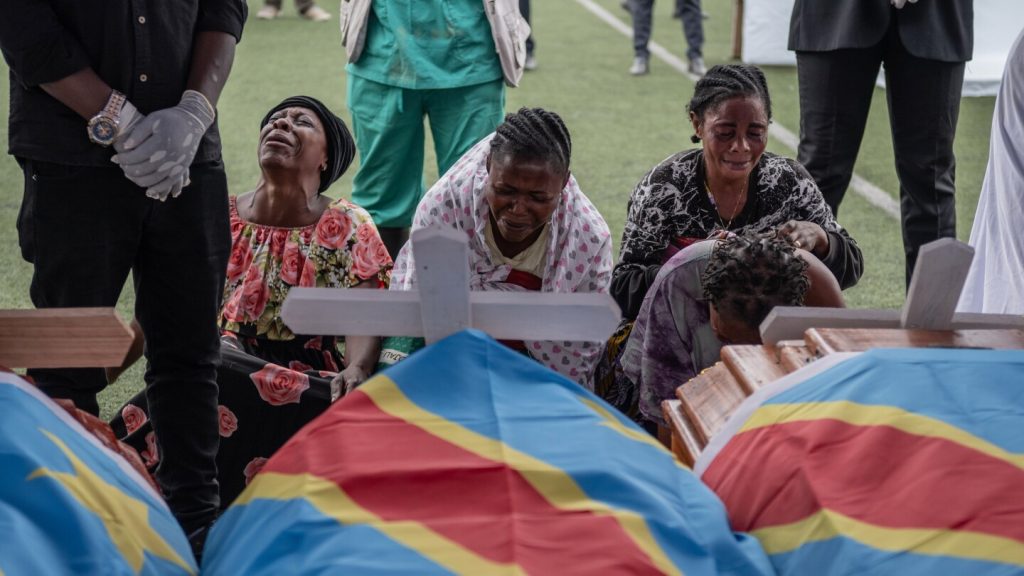 M23 rebel group holds a symbolic funeral for victims of drone strike in eastern Congo