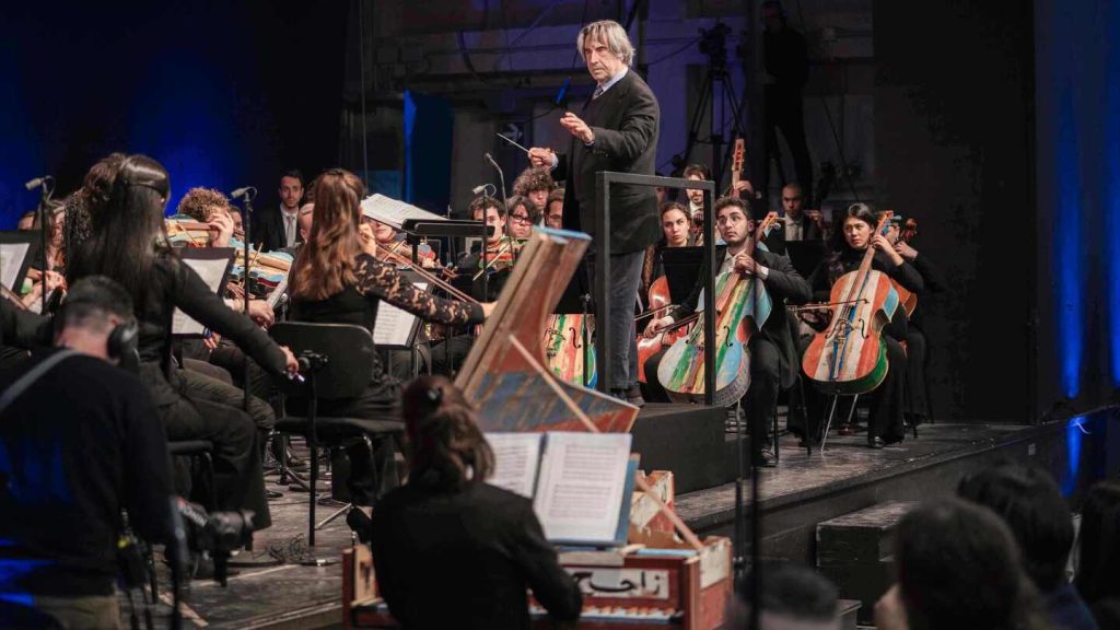 Milan prison hosts concert with instruments made by inmates from migrant smugglers’ boats