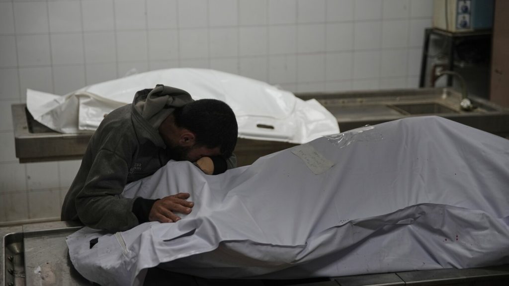 Grandmother and grandson burn to death in Gaza tent while cooking; Jolie visits Rafah crossing