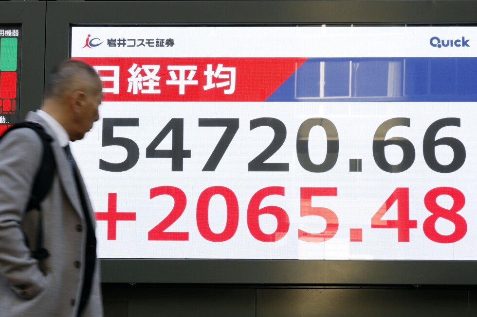 Global shares surge, led by records in Japan and South Korea, as markets regain momentum