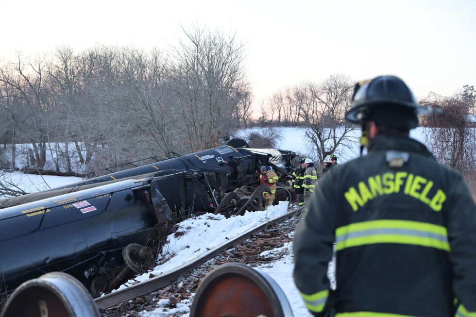 Freight train derails in Connecticut, sending cars carrying liquid propane into river