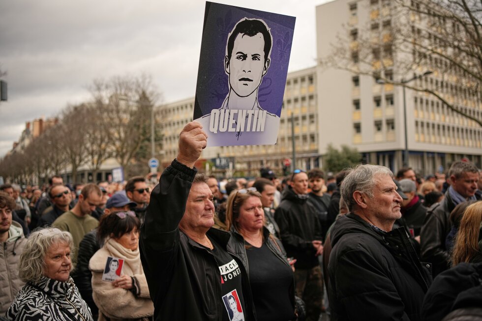 Hundreds march in Lyon to protest far-right activist’s killing as Macron urges calm
