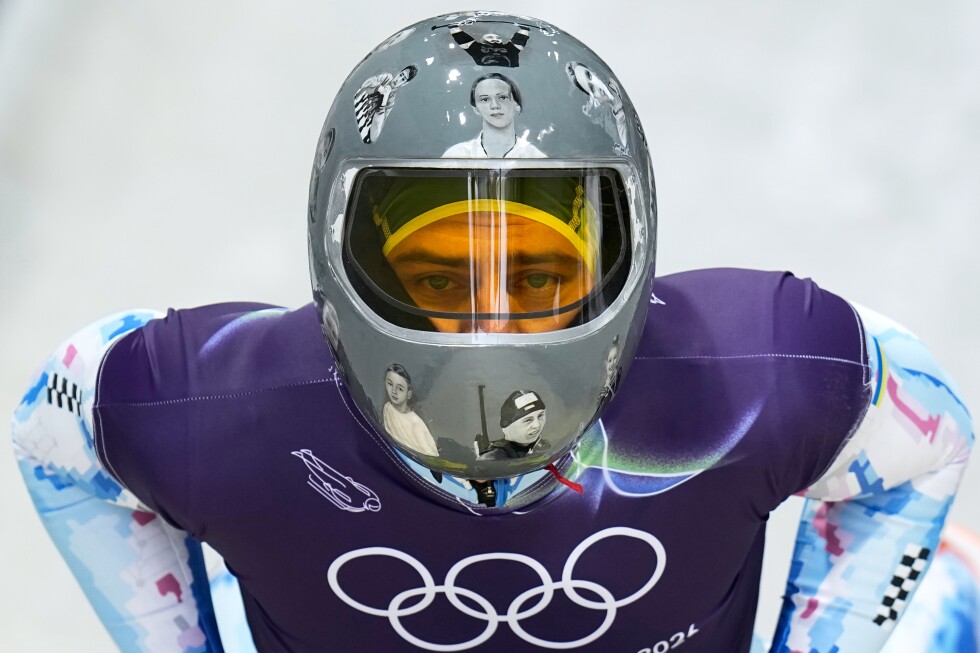 Ukrainian skeleton athlete Vladyslav Heraskevych trains again in banned helmet, despite IOC ruling