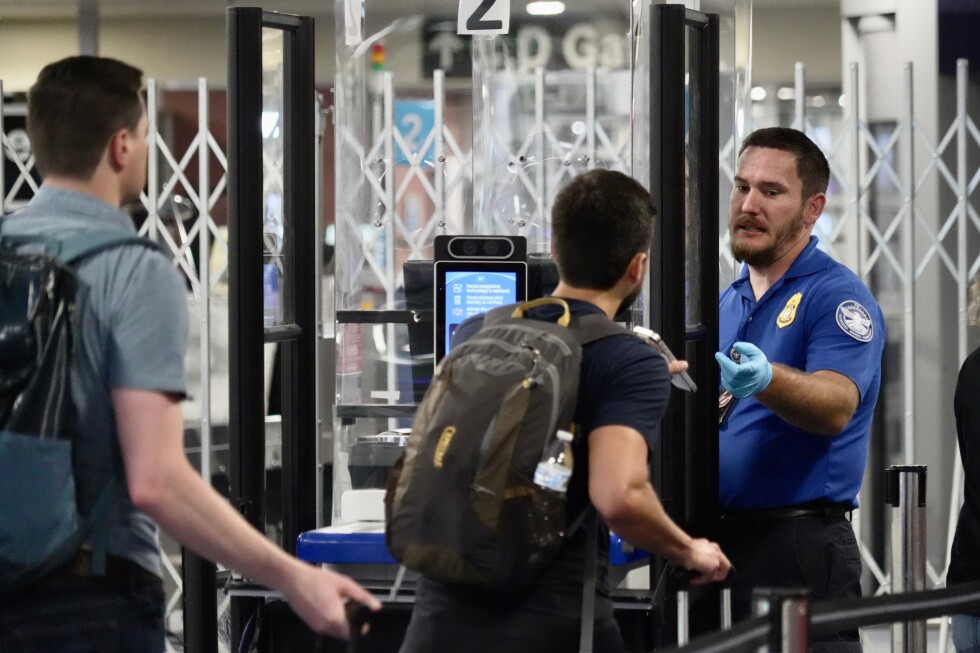 For airline travelers, the shutdown answer is simple: Pay TSA officers
